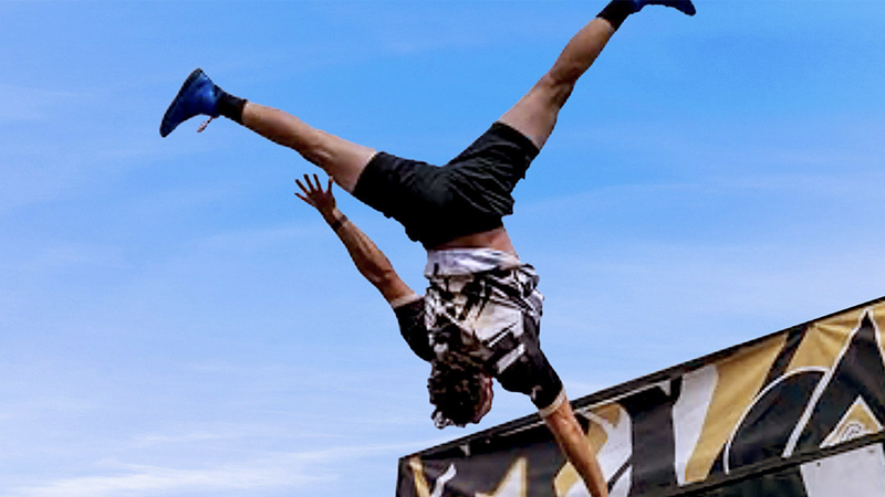 Man performing Off Axis Stunt Show